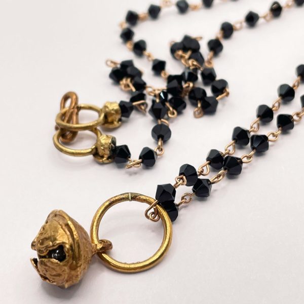 collana swarovski neri e ciondolo campanello in bronzo