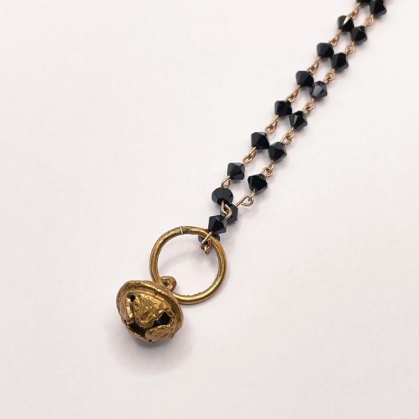 collana swarovski neri e ciondolo campanello in bronzo